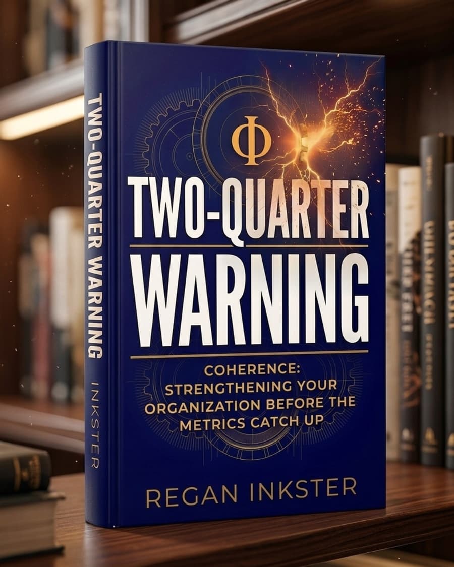 Two-Quarter Warning by Regan Inkster — book cover on a wooden surface in front of a library shelf